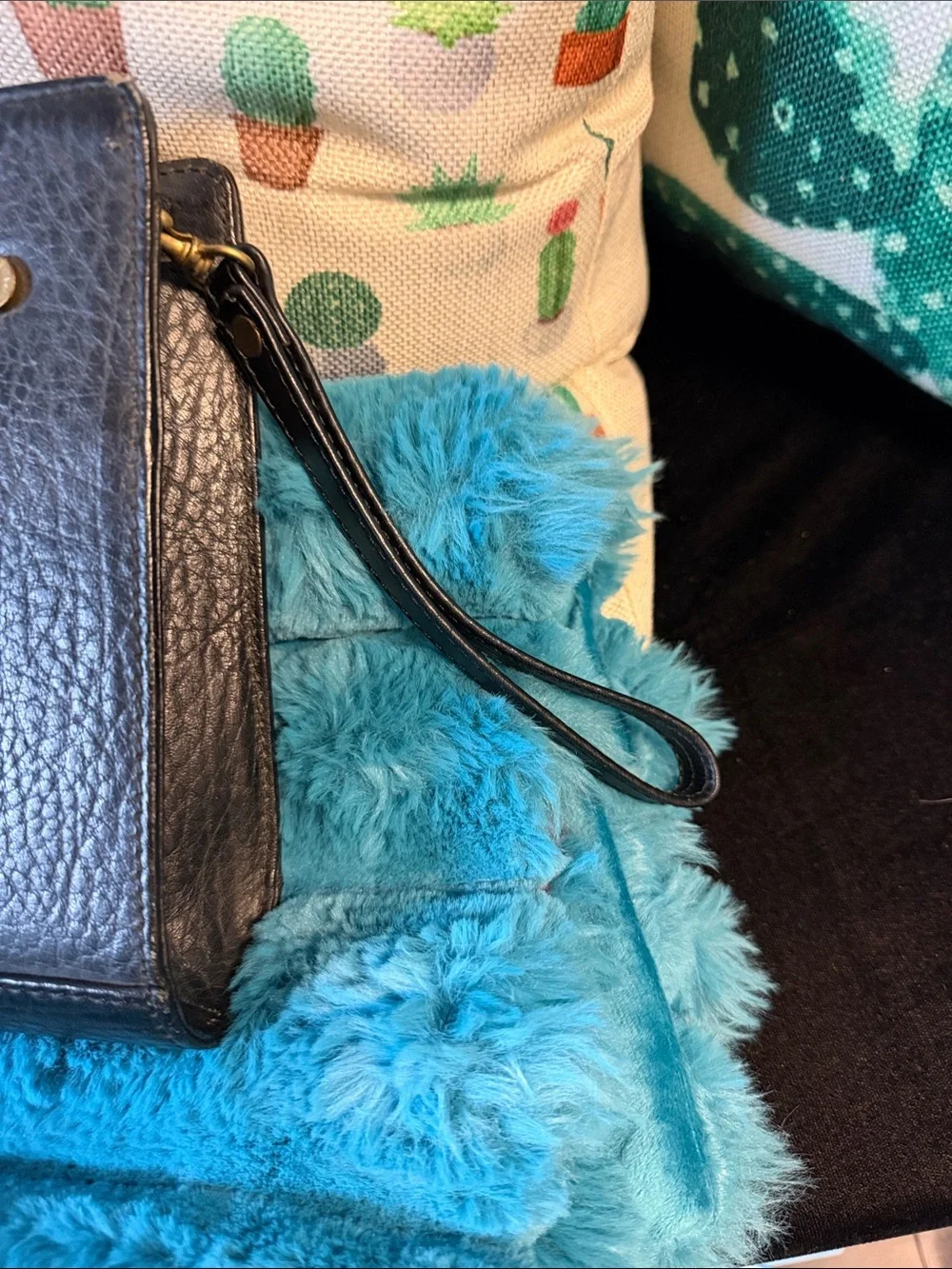 Burberry’s Wristlet or Planner
